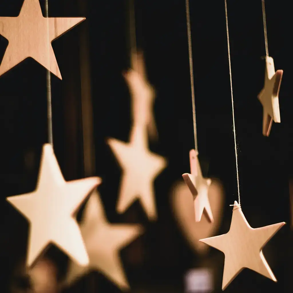 Stars hanging from strings representing the All-Star Dealer Award by Alhua Technology