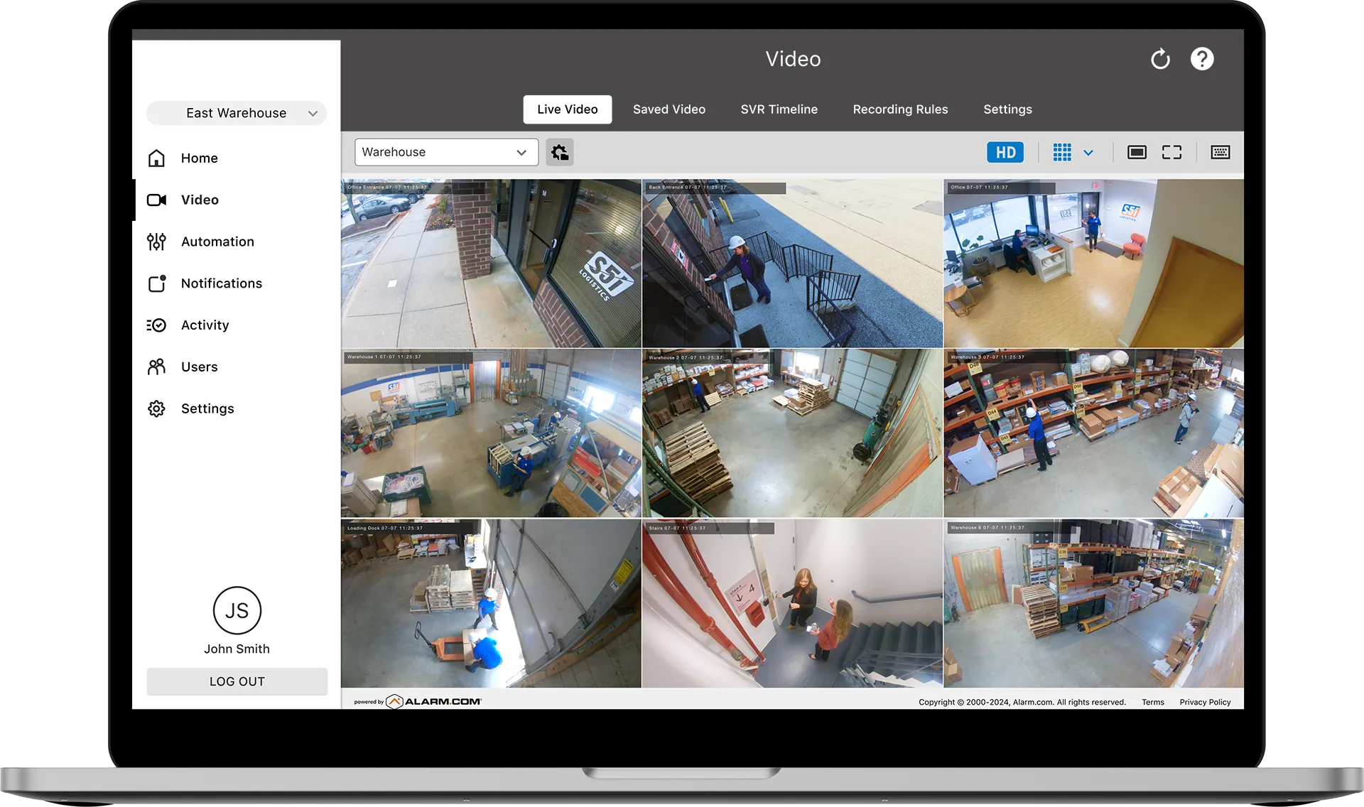 AI-powered video surveillance dashboard displayed on a laptop, enabling remote monitoring of warehouse, office, and loading dock security footage in real time.