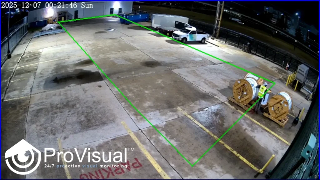 ProVisual™ video footage showing an individual outlined in green by AI detection near electrical wire spools at a secured facility.