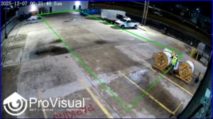 ProVisual™ video footage showing an individual outlined in green by AI detection near electrical wire spools at a secured facility.
